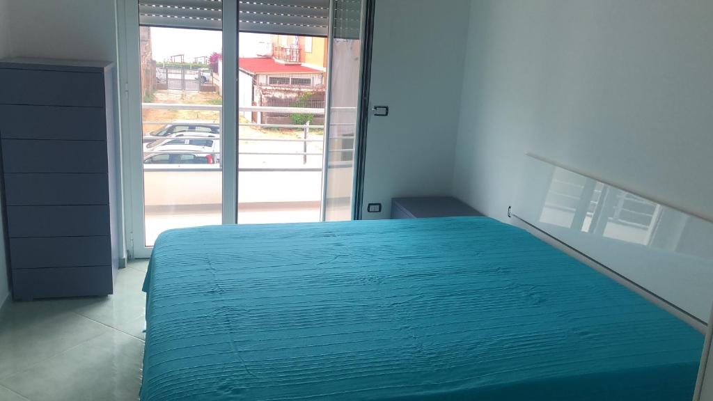 Postel nebo postele na pokoji v ubytování Scauri Inn
