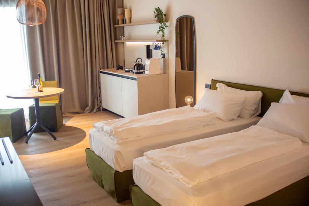 Postel nebo postele na pokoji v ubytování Hotel Fossa Mala