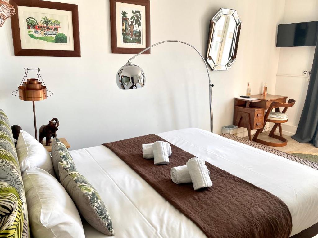 Postel nebo postele na pokoji v ubytování Hôtel Restaurant Gédéon
