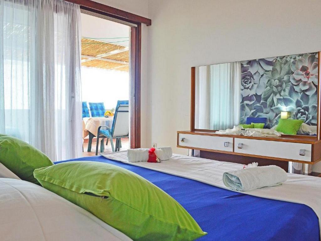 Postel nebo postele na pokoji v ubytování VILLA apartmans KATE