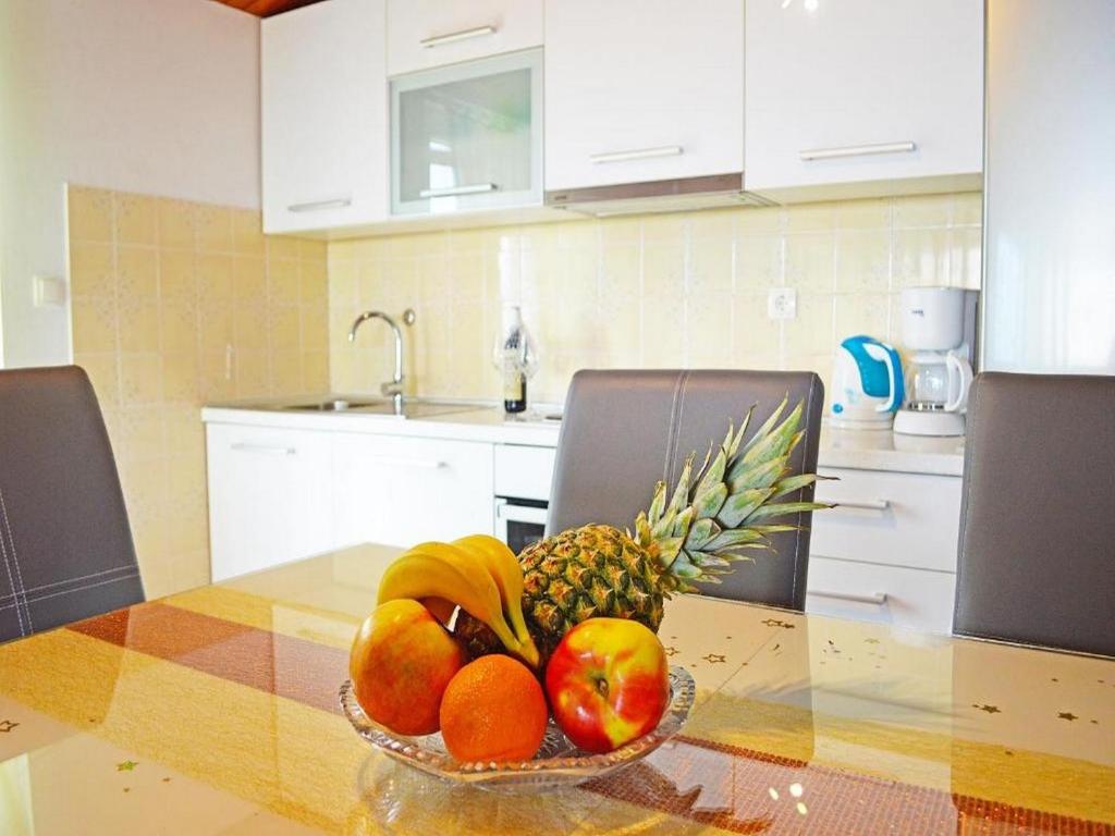Kuchyň nebo kuchyňský kout v ubytování VILLA apartmans KATE