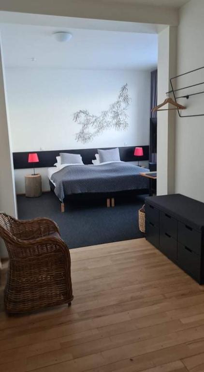 Voodi või voodid majutusasutuse Volcano Hotel toas