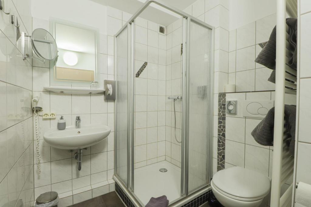 Koupelna v ubytování Hotel Am Dalwigker Tor