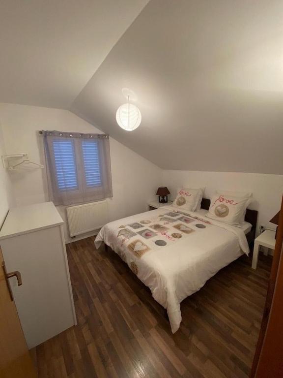 Posteľ alebo postele v izbe v ubytovaní I.K. APARTMENTS
