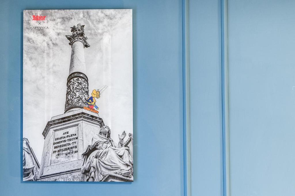 a drawing of a monument with a statue at Capranica Private Suites in Rome