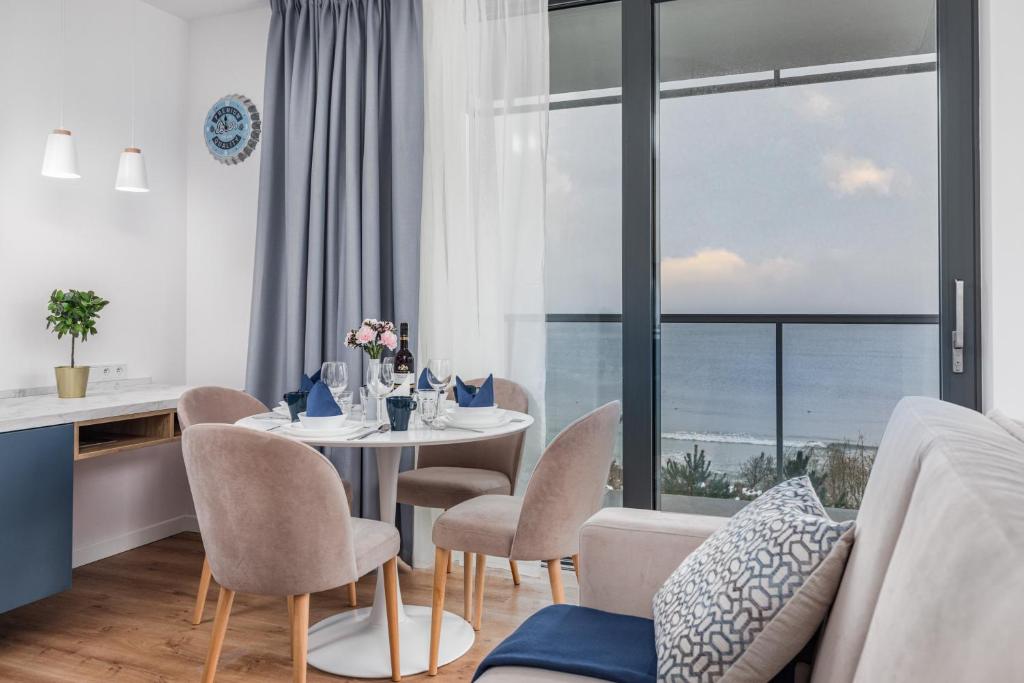 Posezení v ubytování Apartamenty Jantaris SeaView by Noclegi Renters
