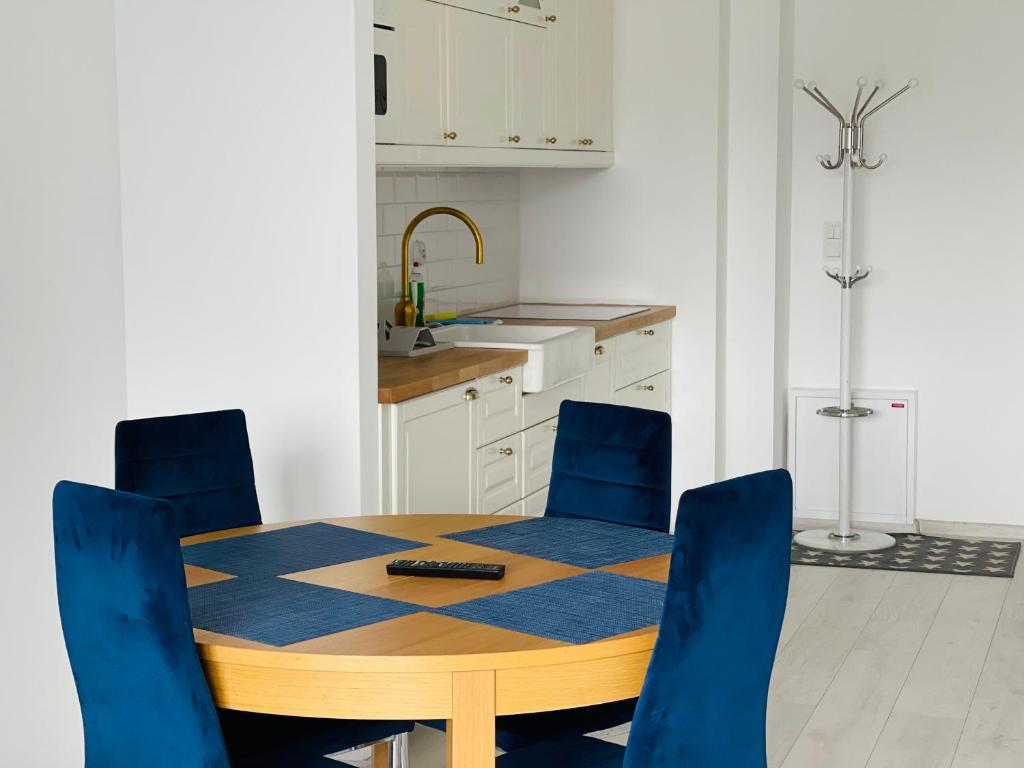 Kuchyňa alebo kuchynka v ubytovaní Promenada Gwiazd 14 by Baltic Home