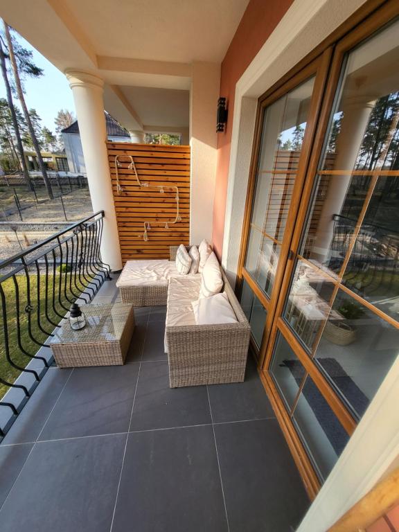 Balkon lub taras w obiekcie APARTAMENT przy jeziorze