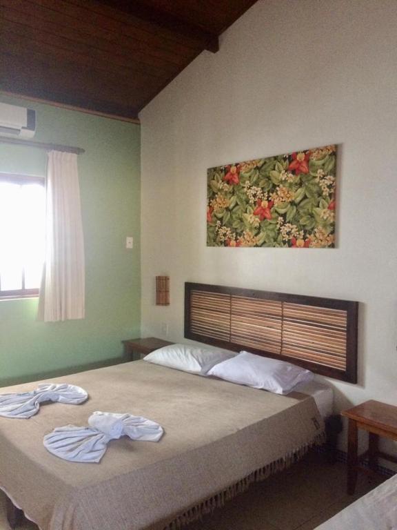 Postel nebo postele na pokoji v ubytování Praia do Forte Hostel