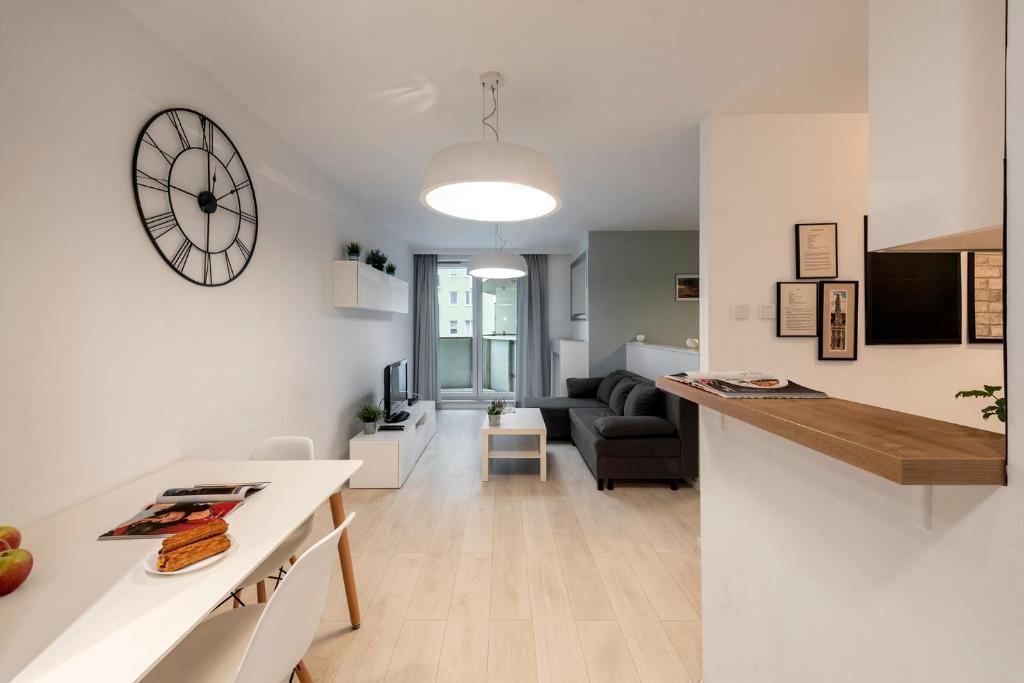 Kuchyňa alebo kuchynka v ubytovaní Waw Apartamenty Manhattan