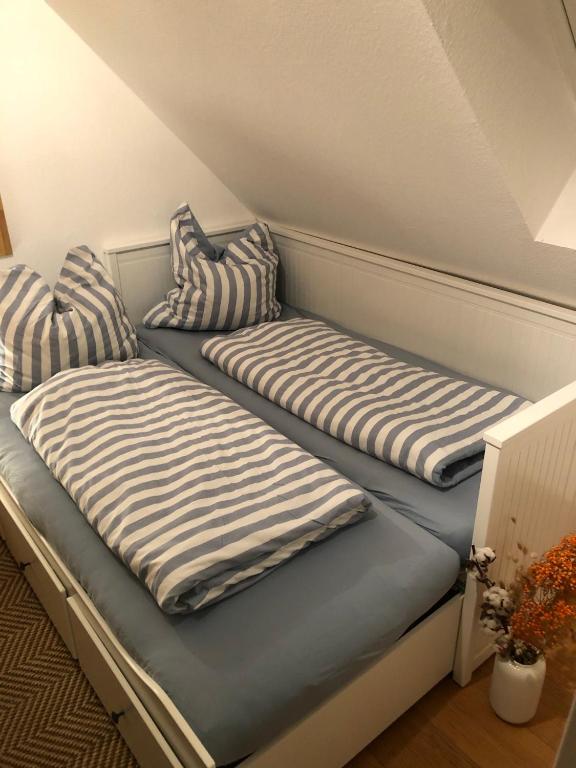 Postel nebo postele na pokoji v ubytování Ferienwohnung Uttied