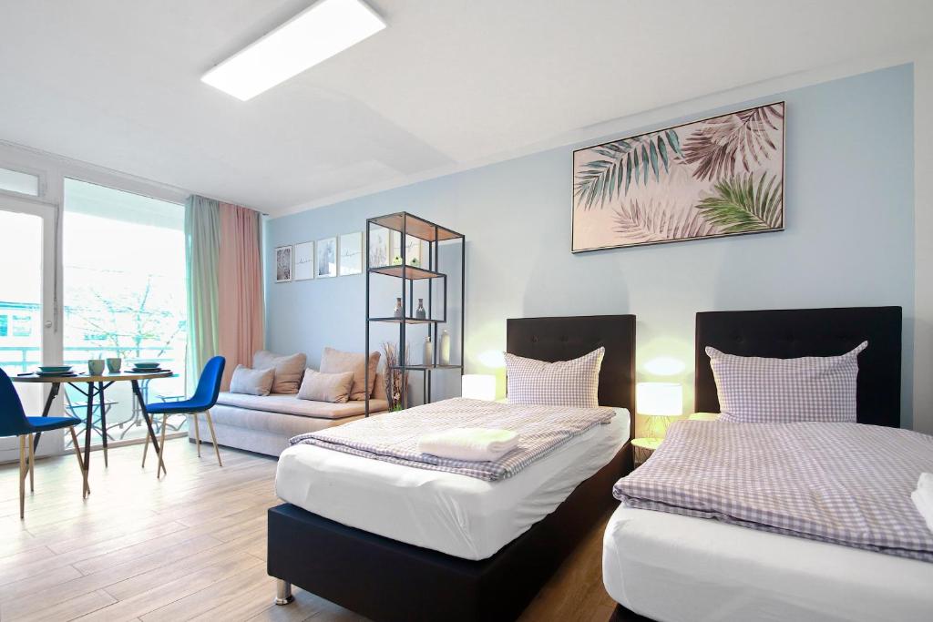 Tempat tidur dalam kamar di Eddy's Rest & Relax - Munich East