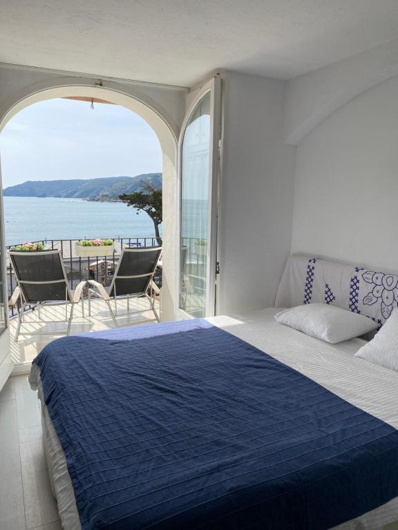 Ένα ή περισσότερα κρεβάτια σε δωμάτιο στο Studio Cala bona