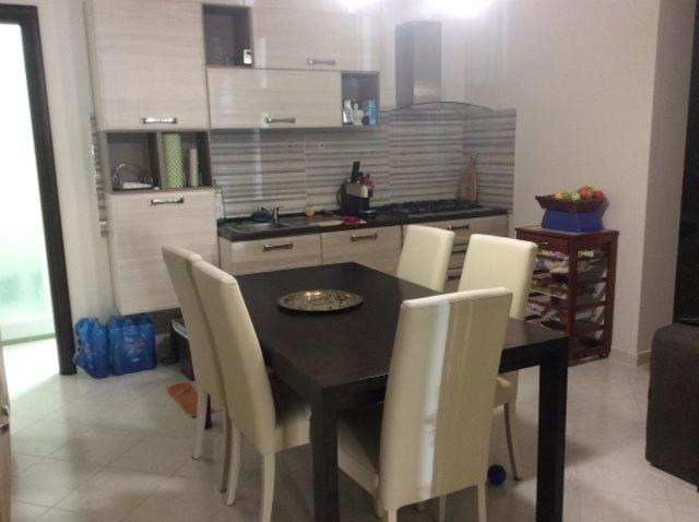 Kuchyň nebo kuchyňský kout v ubytování Apartment Difesa Pizzo