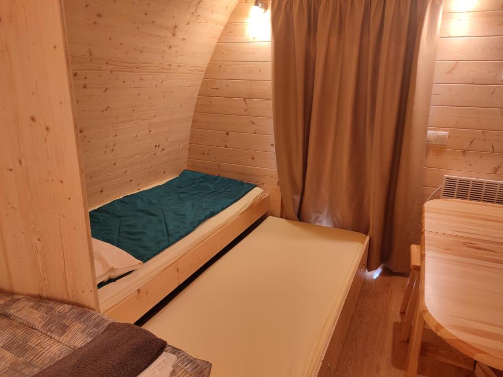 Postel nebo postele na pokoji v ubytování TEIRABOA BASE CAMP