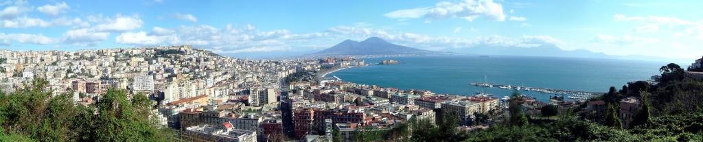 a view of a city with a mountain and water at CASA VACANZE "A casa di Maria" in Naples