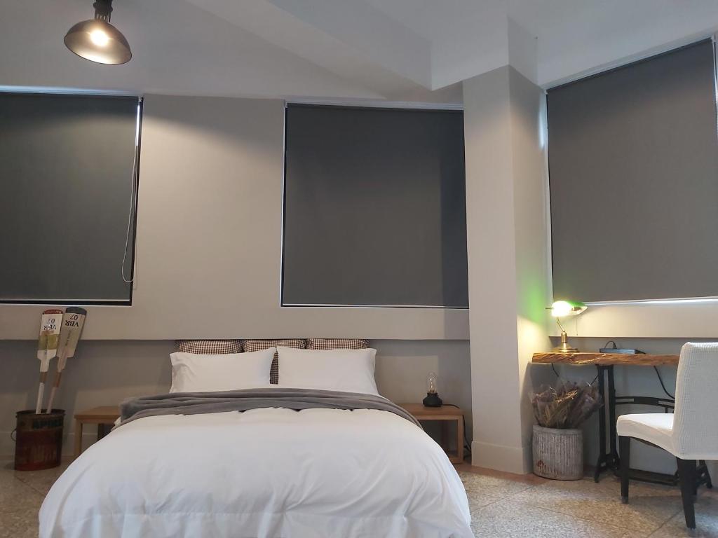 Postel nebo postele na pokoji v ubytování Huck B&B