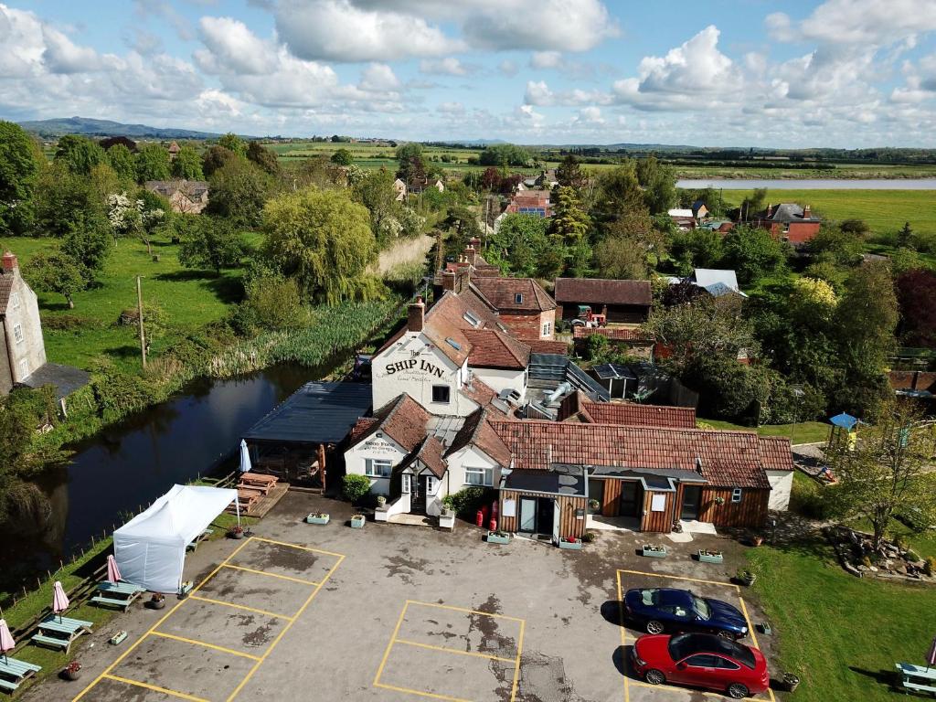 an aerial view of a small town with a river at The Ship Inn in Gloucester