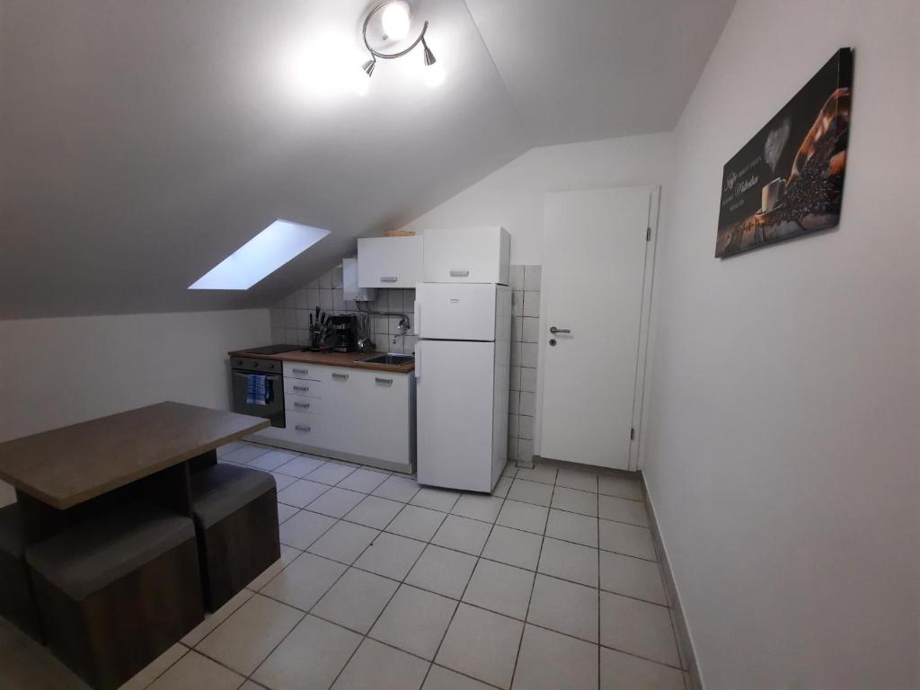 Kuchyňa alebo kuchynka v ubytovaní Apartments LUNA