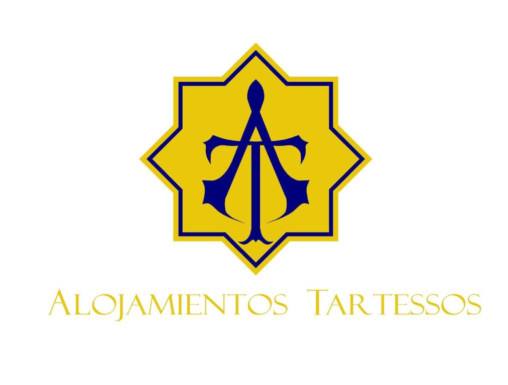 un logo pour le clan akiminas tarsos dans l'établissement Alojamientos Tartessos, à Villamanrique de la Condesa