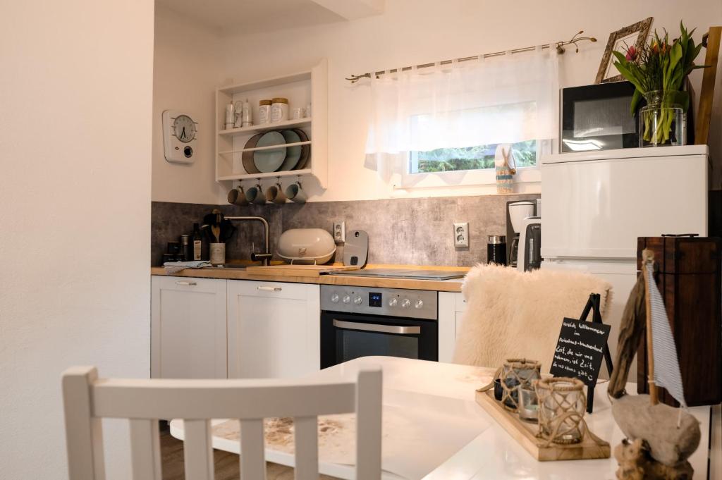 Kuchyň nebo kuchyňský kout v ubytování Ferienhaus Neuseenland