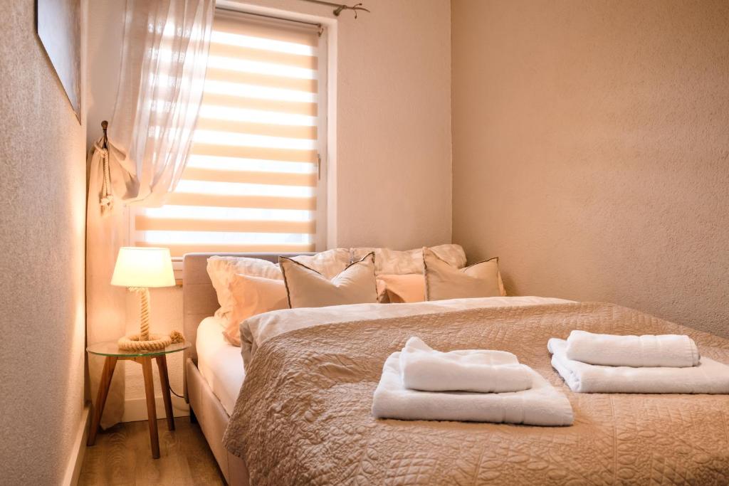 Postel nebo postele na pokoji v ubytování Ferienhaus Neuseenland