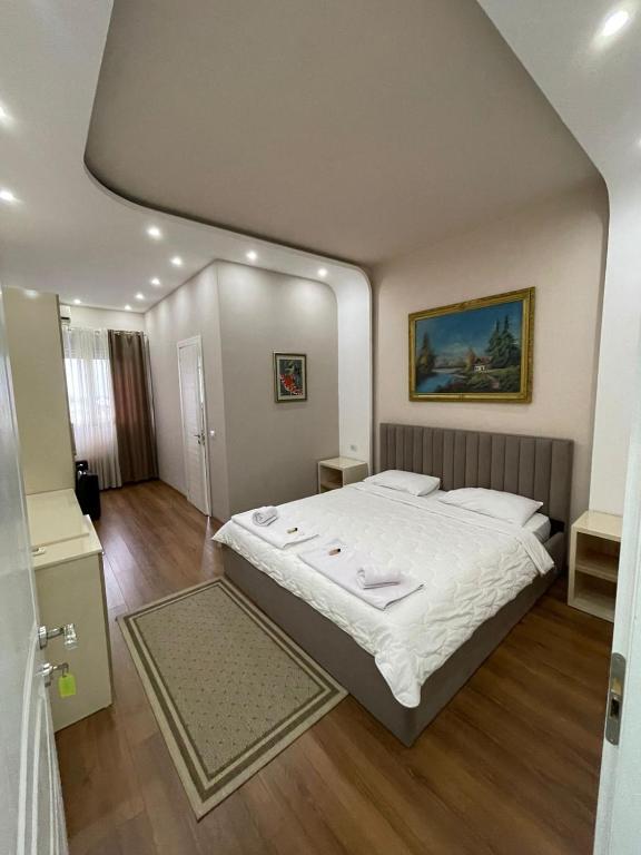 Postel nebo postele na pokoji v ubytování Hotel Holiday