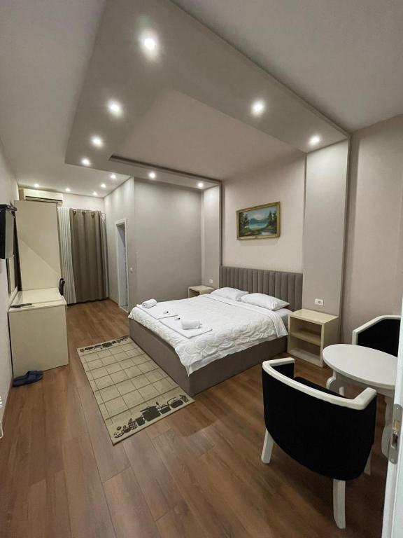 Postel nebo postele na pokoji v ubytování Hotel Holiday