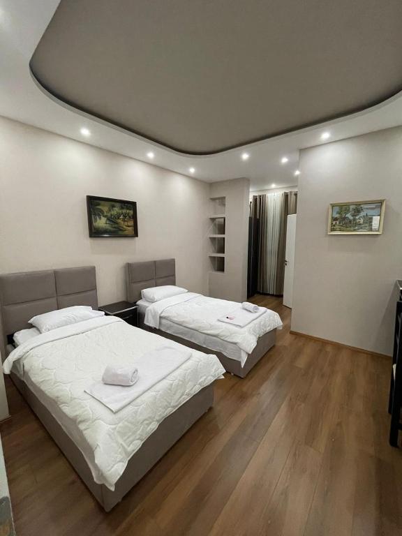 Postel nebo postele na pokoji v ubytování Hotel Holiday