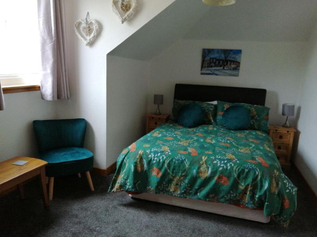 Postel nebo postele na pokoji v ubytování Don Muir Guesthouse