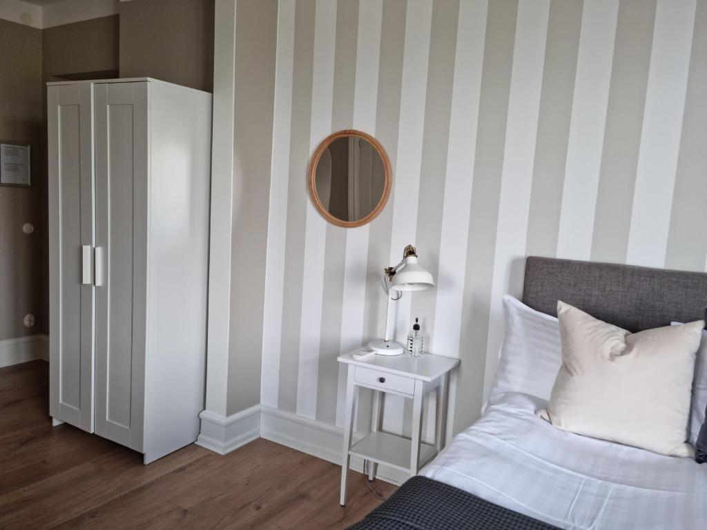 Postel nebo postele na pokoji v ubytování Hotell Stavstensgården