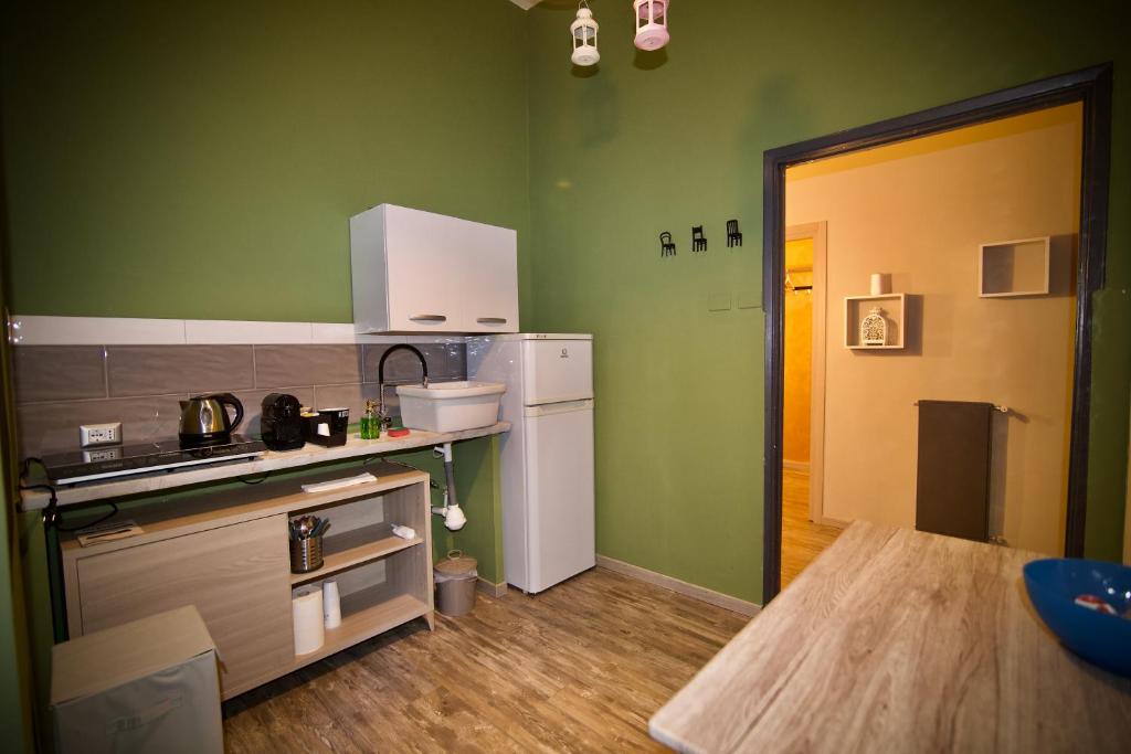 Kuchyňa alebo kuchynka v ubytovaní Home Art Colosseo