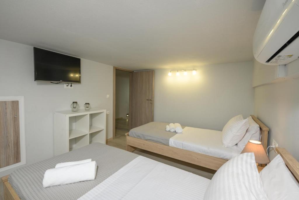 A bed or beds in a room at EA Lofthouse