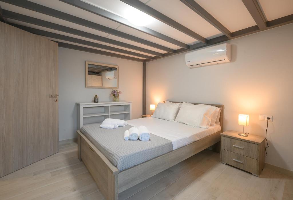 A bed or beds in a room at EA Lofthouse