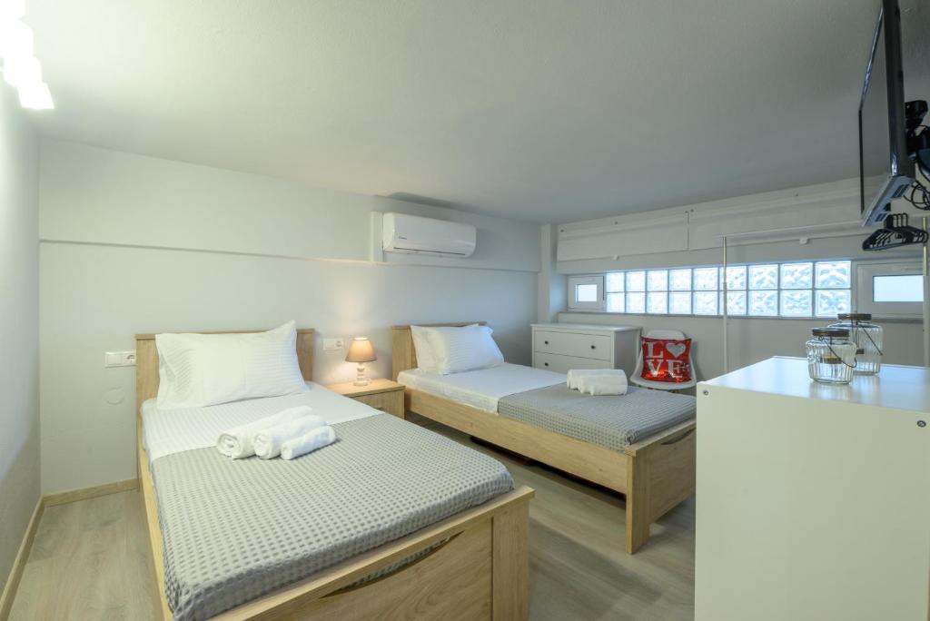 A bed or beds in a room at EA Lofthouse