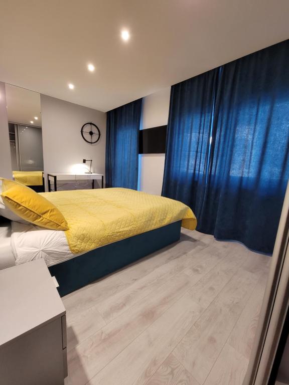 Posteľ alebo postele v izbe v ubytovaní Luksusowy apartament na Starym Miescie