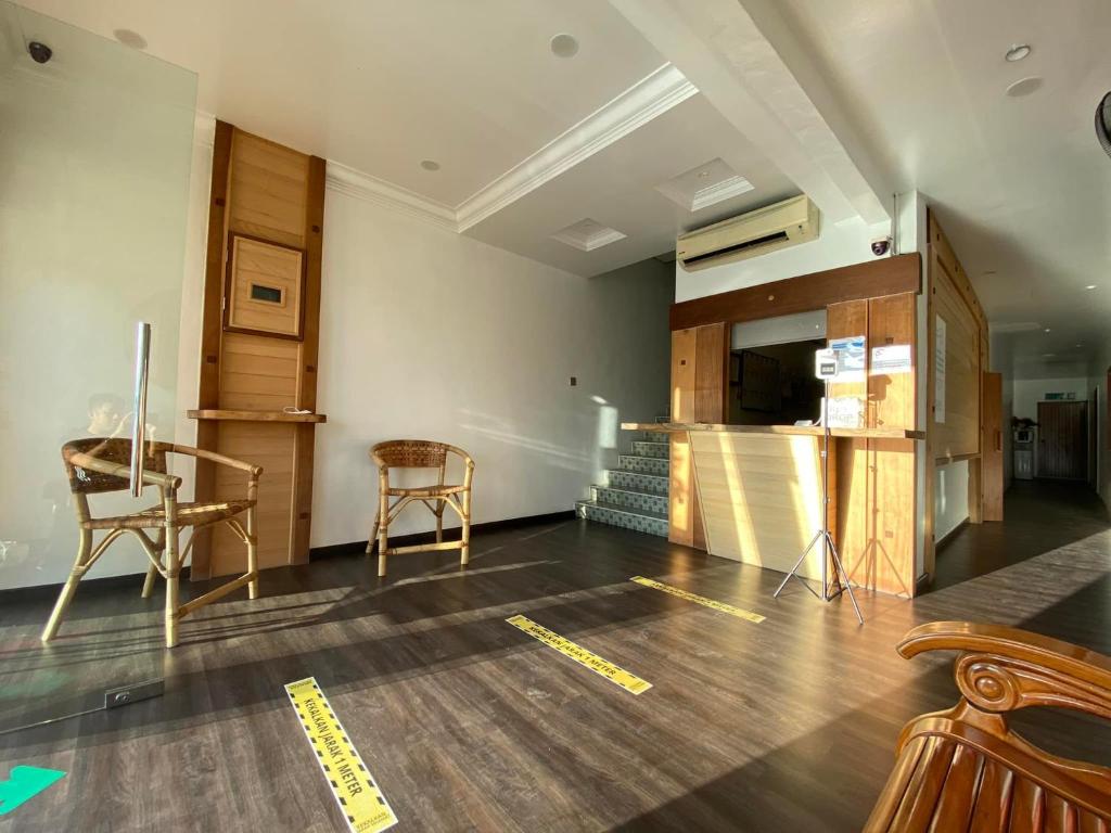 TV a/nebo společenská místnost v ubytování HOTEL MIRAMA 美麗華酒店