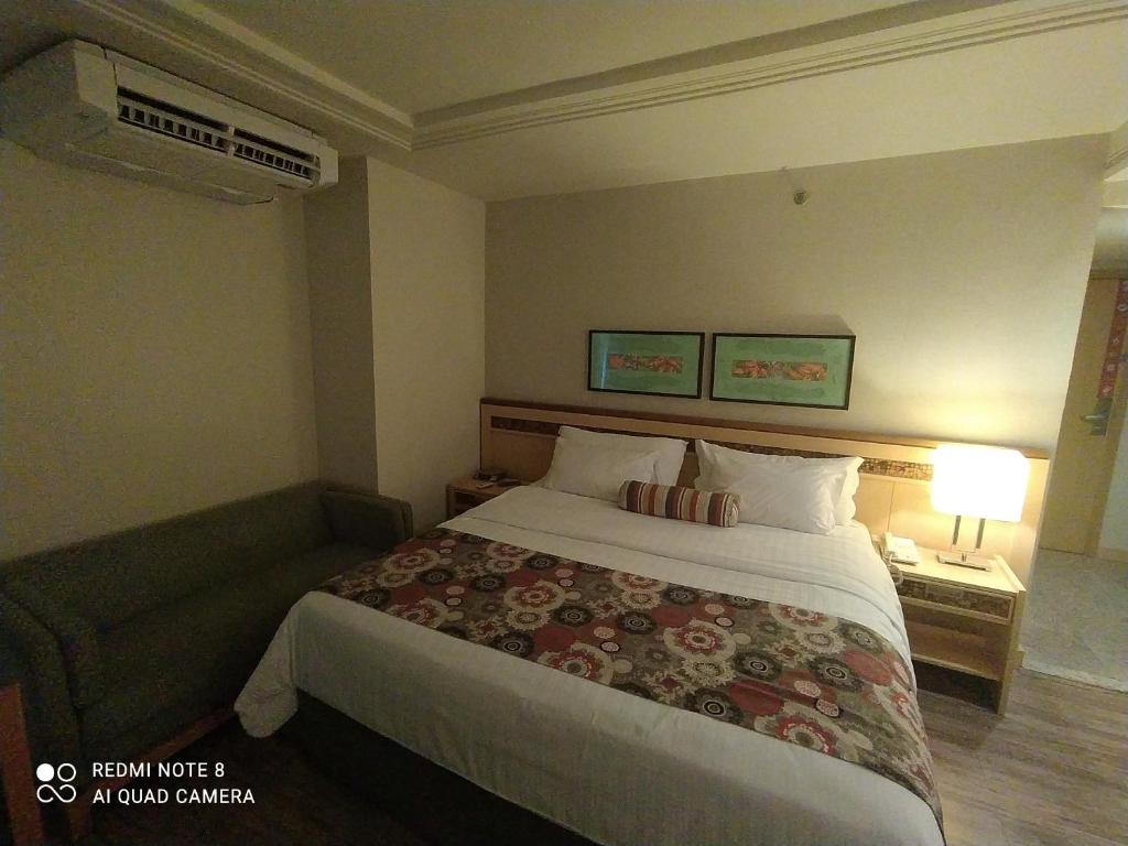 Quartos em alto-padrão LETs IDEA - Deluxe King Room