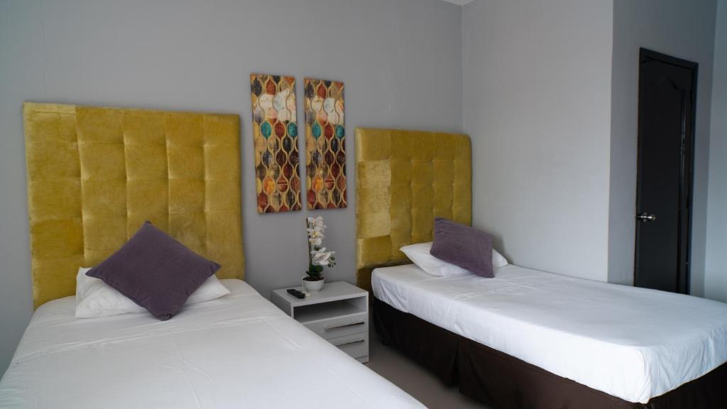 Postel nebo postele na pokoji v ubytování Hotel Boutique Casa Umiña