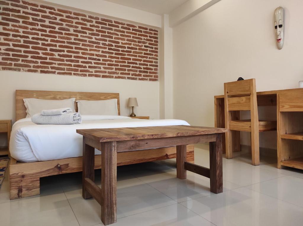 Postel nebo postele na pokoji v ubytování Sayami Home