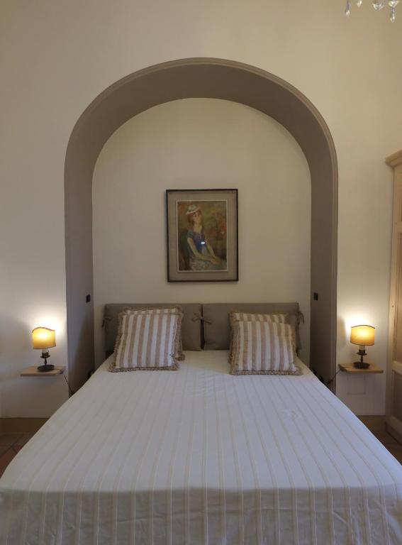 Postel nebo postele na pokoji v ubytování Casa Raiola Ercolano Luxury Rooms & Spa