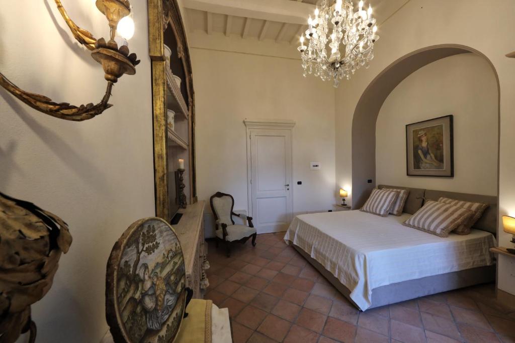 Postel nebo postele na pokoji v ubytování Casa Raiola Ercolano Luxury Rooms & Spa