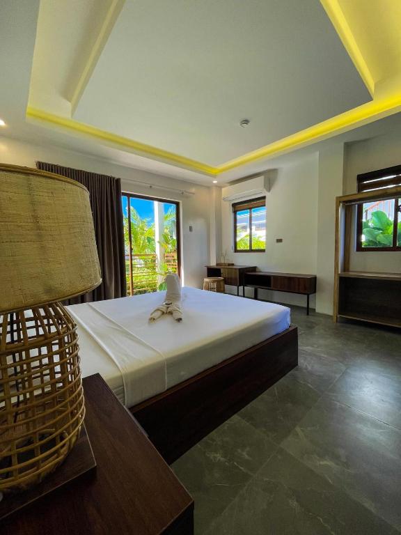 Postel nebo postele na pokoji v ubytování Red Picnic Hostel Panglao