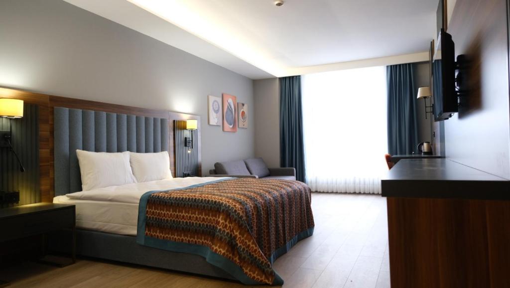 Postel nebo postele na pokoji v ubytování İncipark Hotel