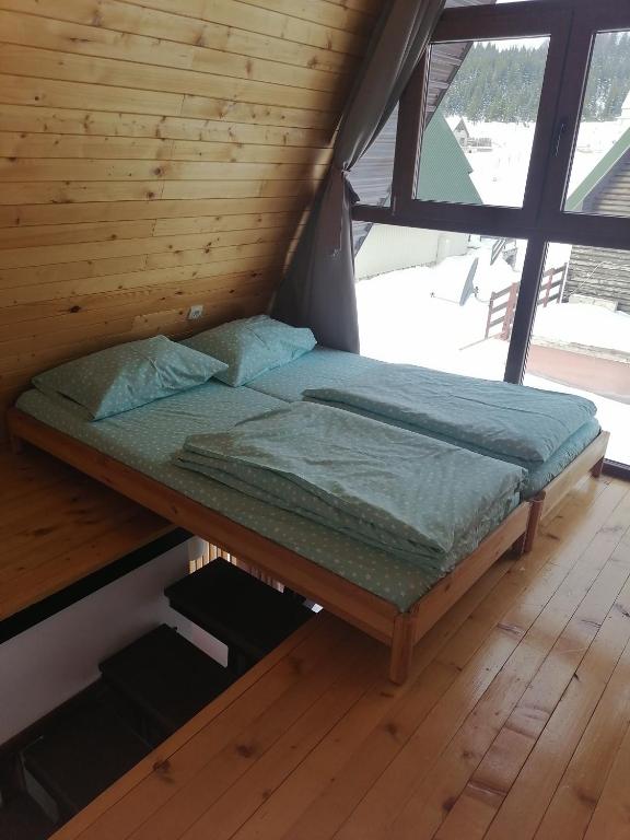 Postel nebo postele na pokoji v ubytování Lazar&Mila Apartments