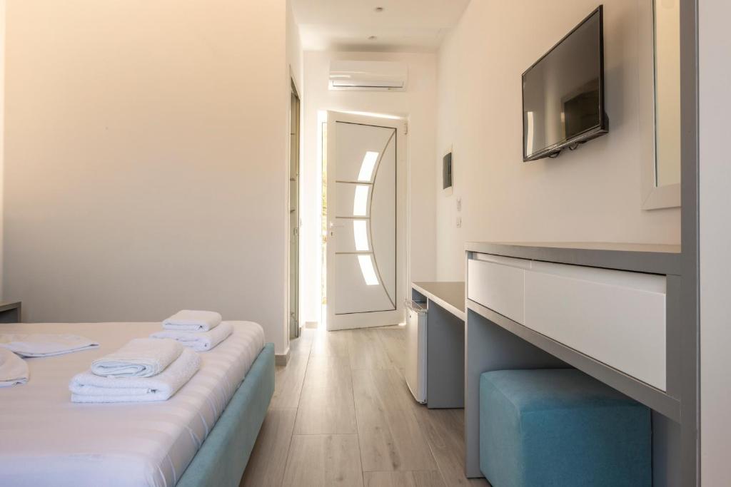 Postel nebo postele na pokoji v ubytování Seaside Hotel