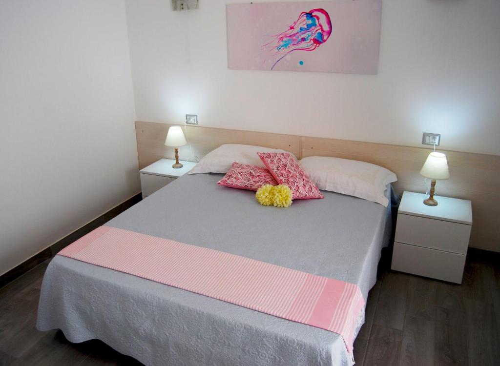 Posteľ alebo postele v izbe v ubytovaní B&B Capo Rizzuto fronte Mare