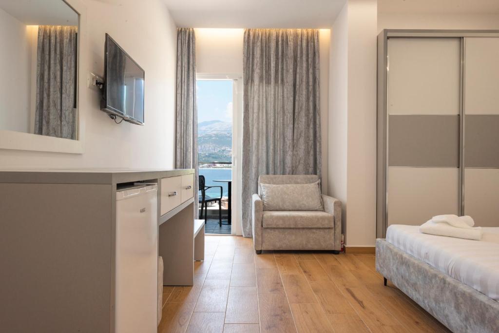 Postel nebo postele na pokoji v ubytování Seaside Hotel