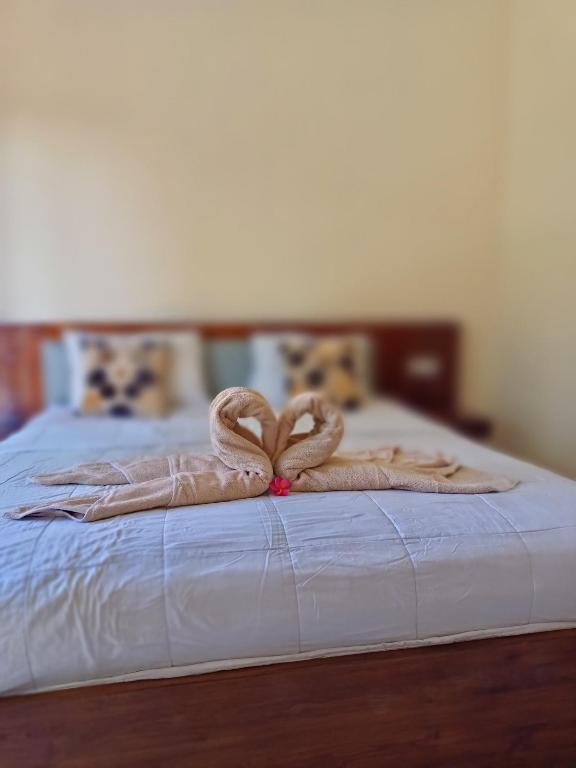 Postel nebo postele na pokoji v ubytování Diary home stay