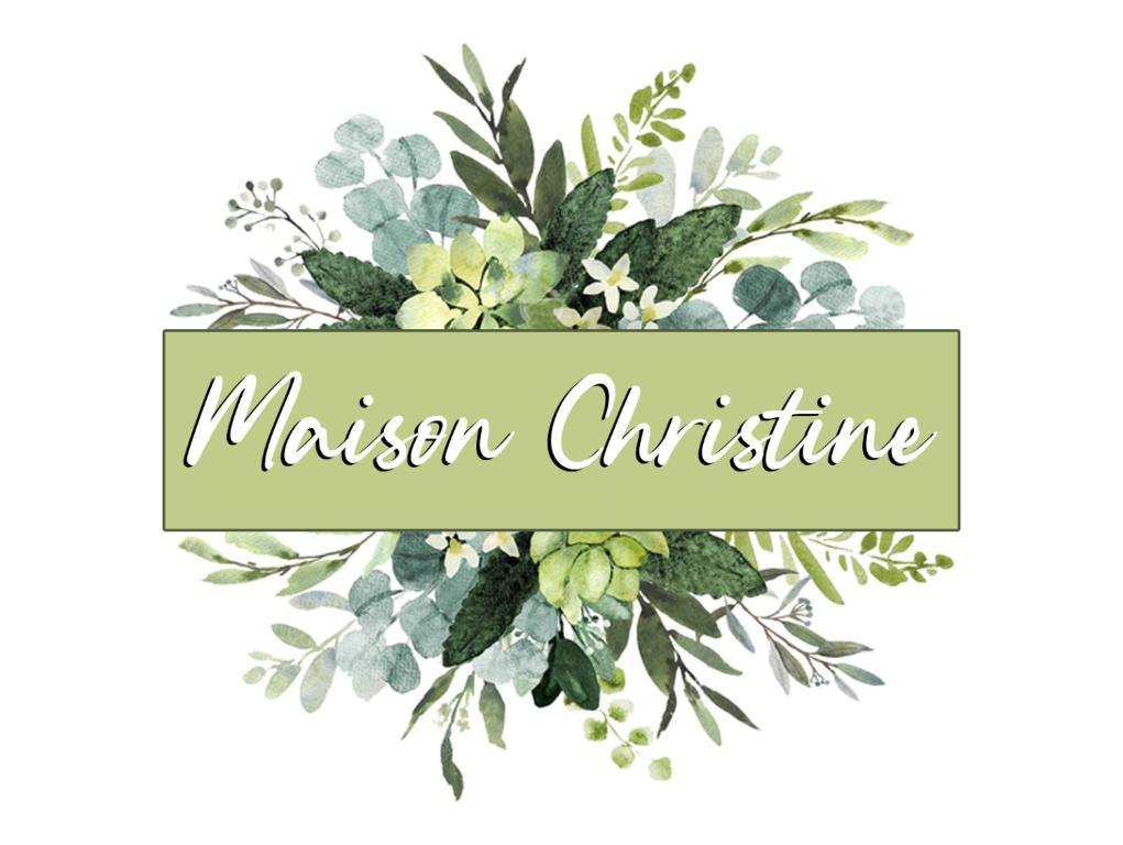 a watercolor christmas wreath of flowers and greenery at Maison Christine in Turin